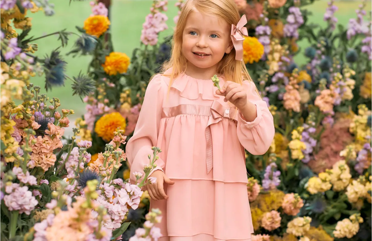 Beautiful Pink&nbsp; chiffon dress with ruffle and Bow details.
